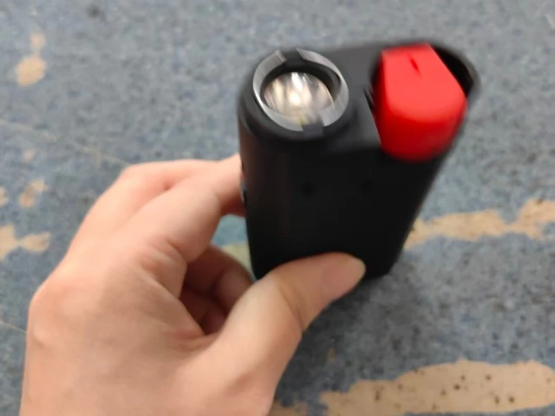 Multifunctional security device with flashlight and spray function Multifunctional security device with flashlight and spray function
